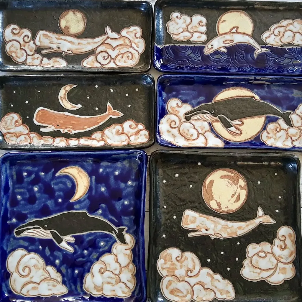 Dolphin and whale decorated plates