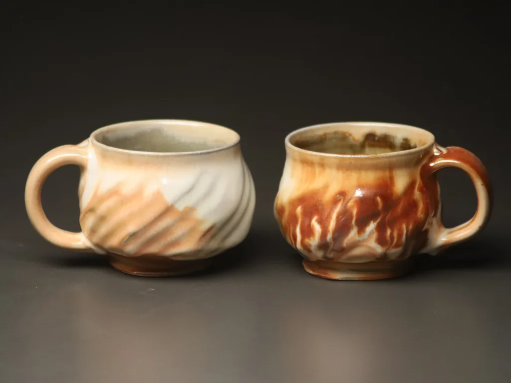 Faceted shino teacup pair