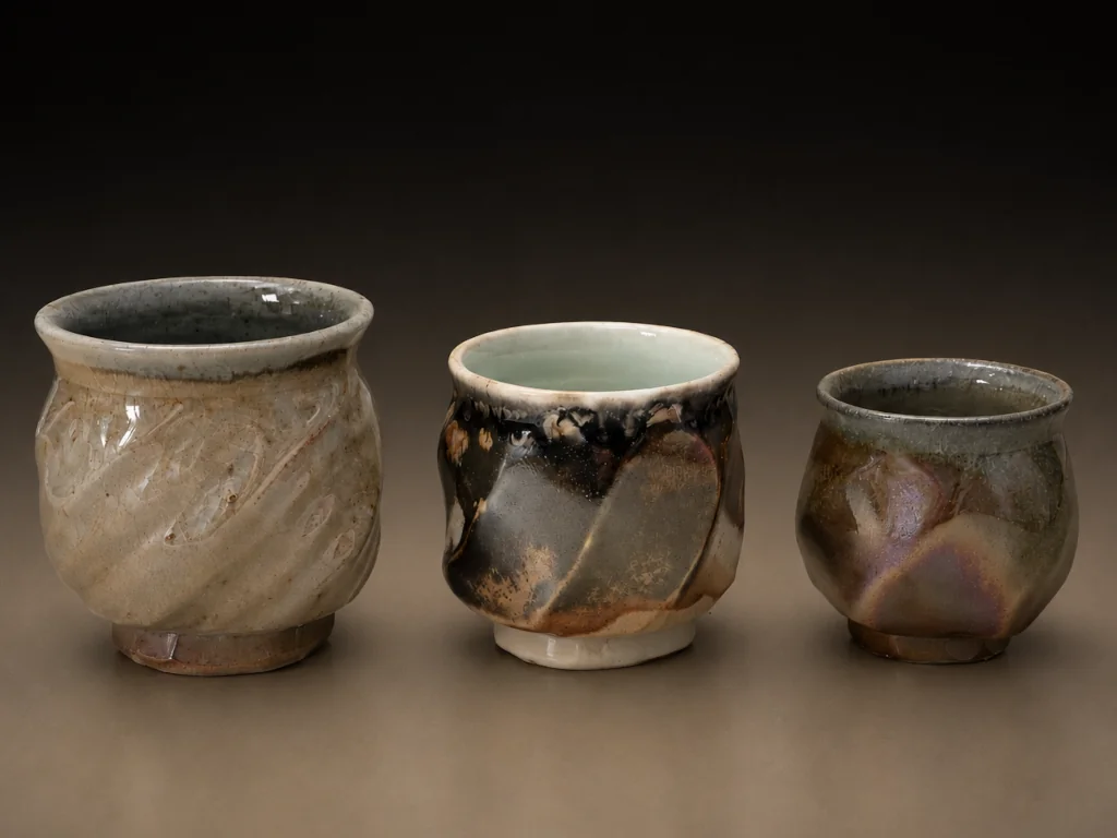Three teacups in varied sizes