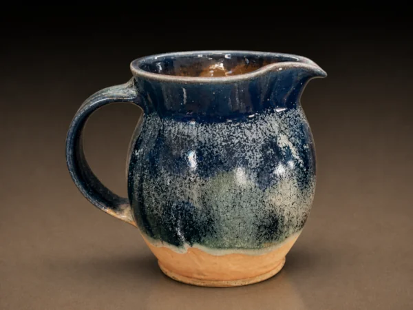 Blue glaze and tan matte pitcher