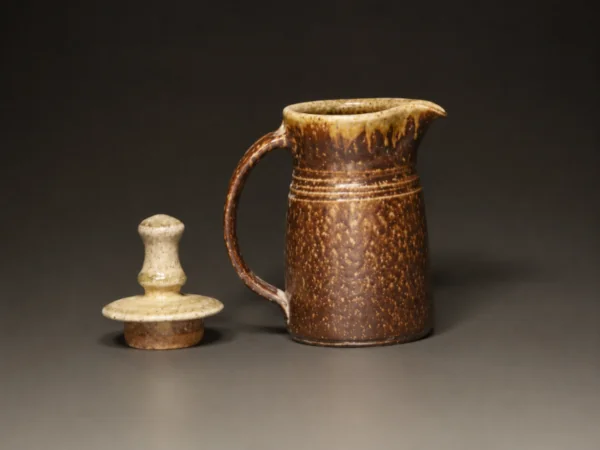 Bronze and copper speckled pitcher