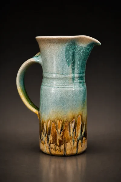 Green and gold wood-salt fired pitcher