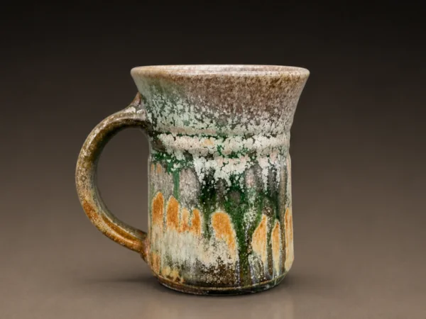 Speckled green, grey, and gold salt-fired pitcher