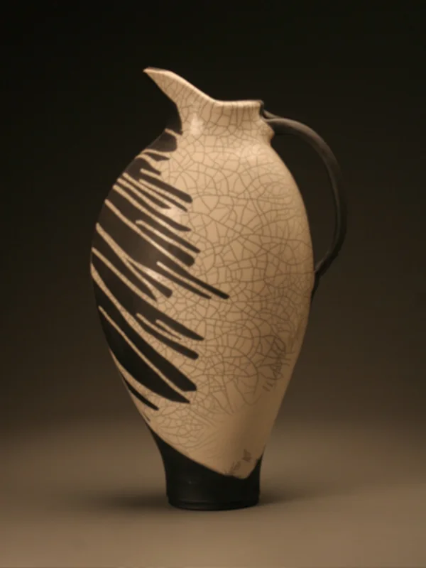 Large raku pitcher with crackle glaze